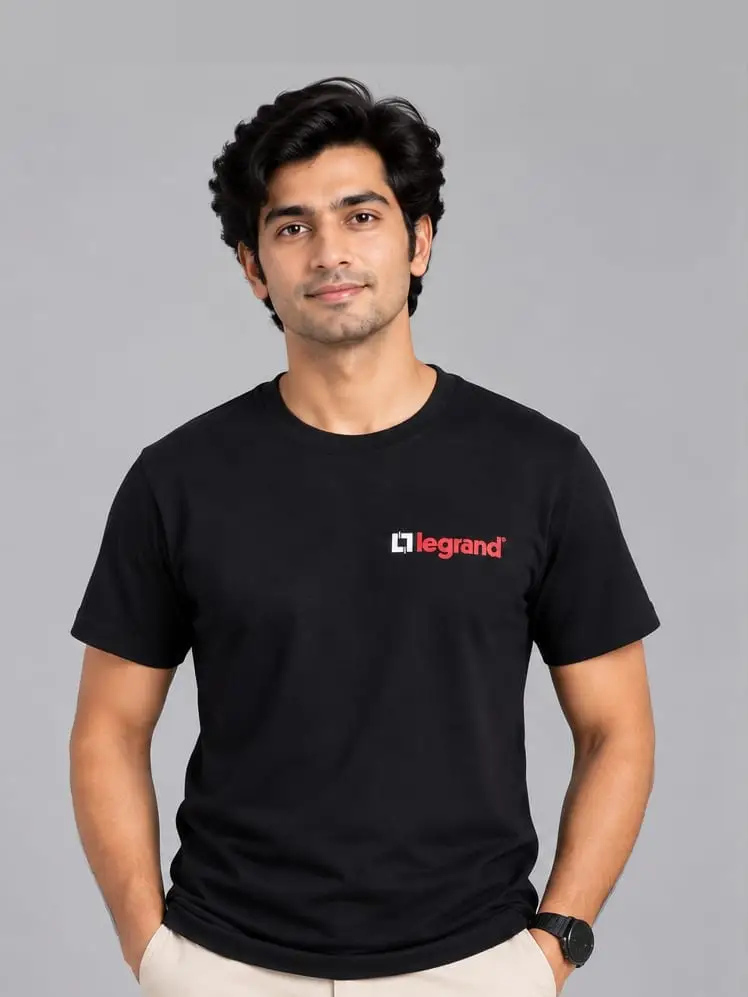 A model in a black crew-neck t-shirt, the Legrand logo printed in red and white at the chest.